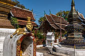 Wat Xieng Thong temple in Luang Prabang, Laos. Small 'that' (stupa) inside the temple precinct. 